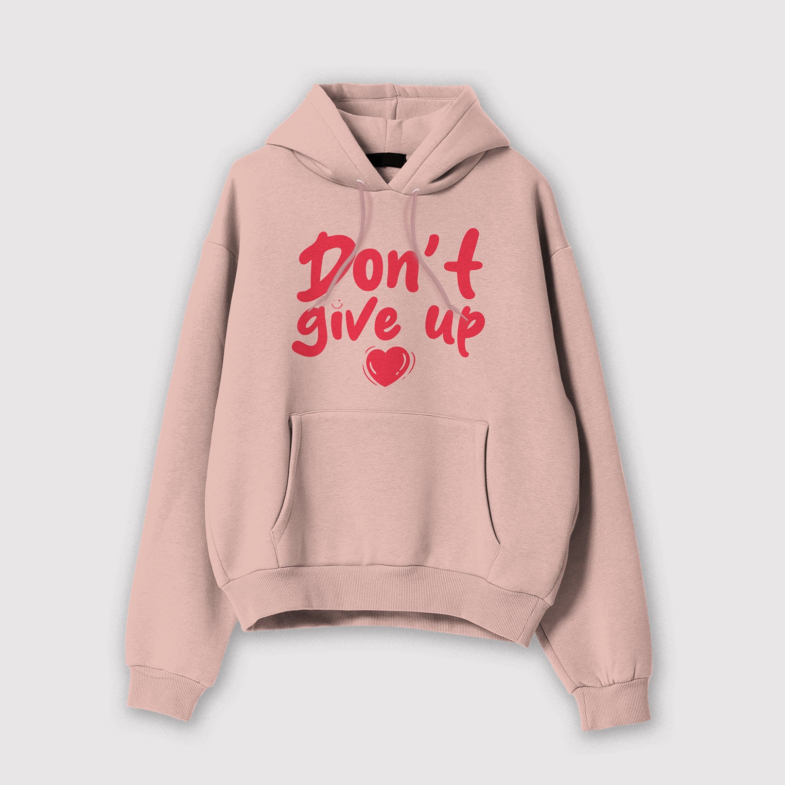 Mockup felpa donna rosa con cappuccio in cotone organico e scritta rossa “Don't give up” Totally Random