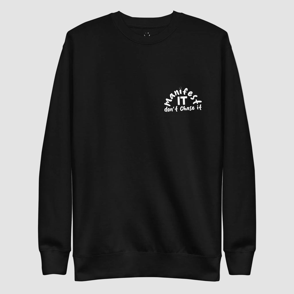 mockup frontale felpa unisex girocollo nera con scritta bianca in inglese  manifest it don't chase it - Totally Random®