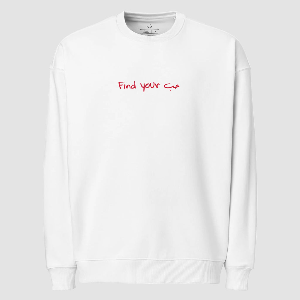 mockup felpa unisex oversize bianca con scritta rossa in inglese e arabo find your love - Totally Random®