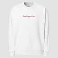 mockup felpa unisex oversize bianca con scritta rossa in inglese e arabo find your love - Totally Random®