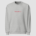 mockup felpa unisex oversize grigia con scritta rossa in inglese e arabo find your fire - Totally Random®