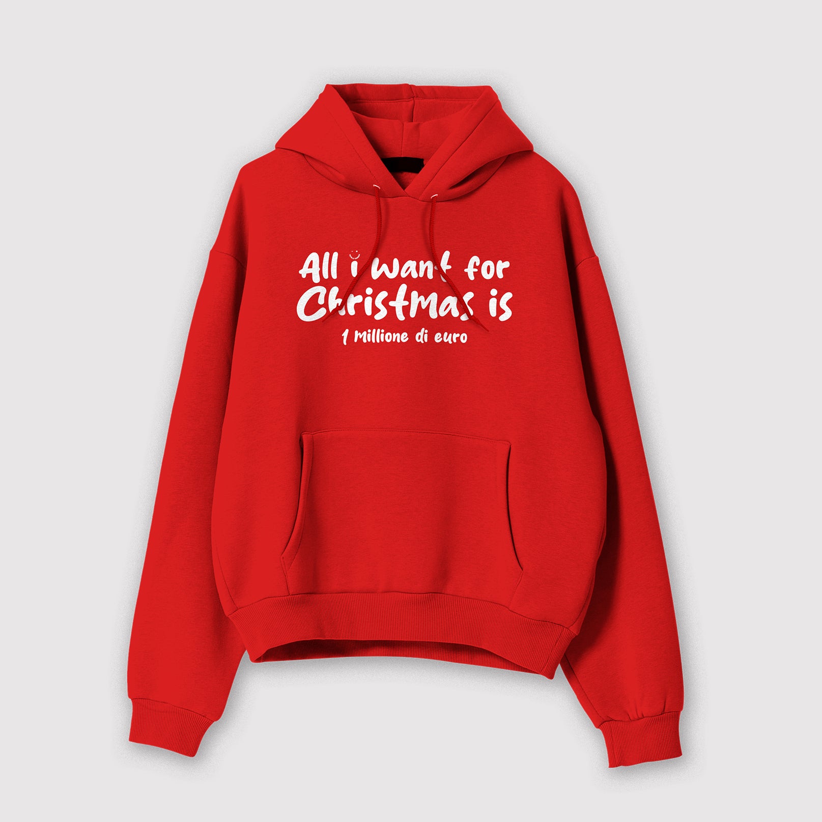 Mockup felpa uomo rossa con cappuccio in cotone organico e scritta bianca “All i want for Christmas is 1 milione di Euro” Totally Random