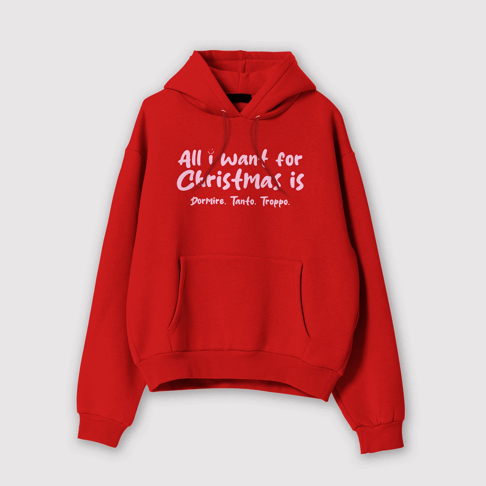 Mockup felpa donna rossa con cappuccio in cotone organico e scritta rosa “All i want for Christmas is Dormire tanto troppo” Totally Random