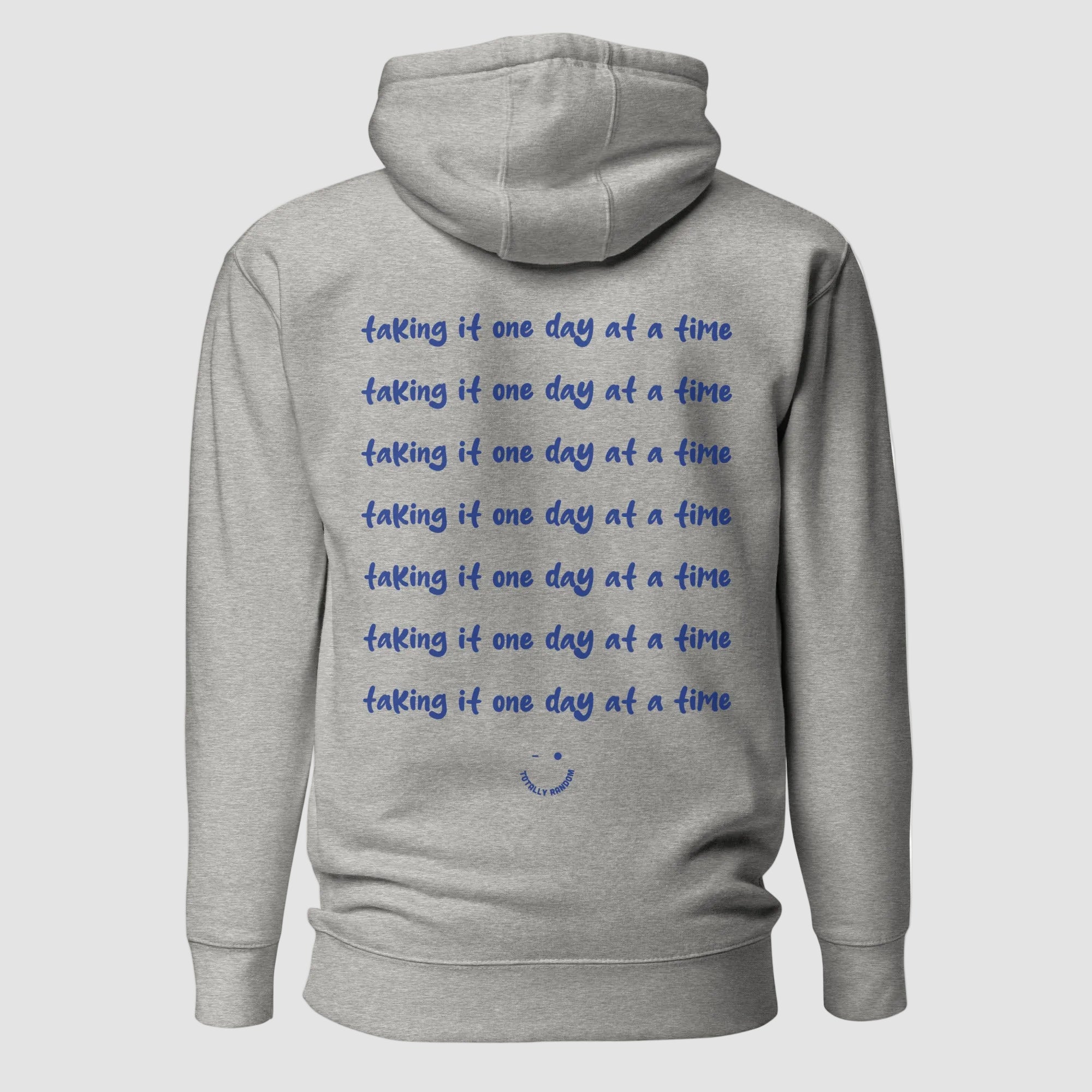 mockup retro felpa unisex grigia con cappuccio e scritta blu in inglese sulla schiena taking it one day at a time - Totally Random®