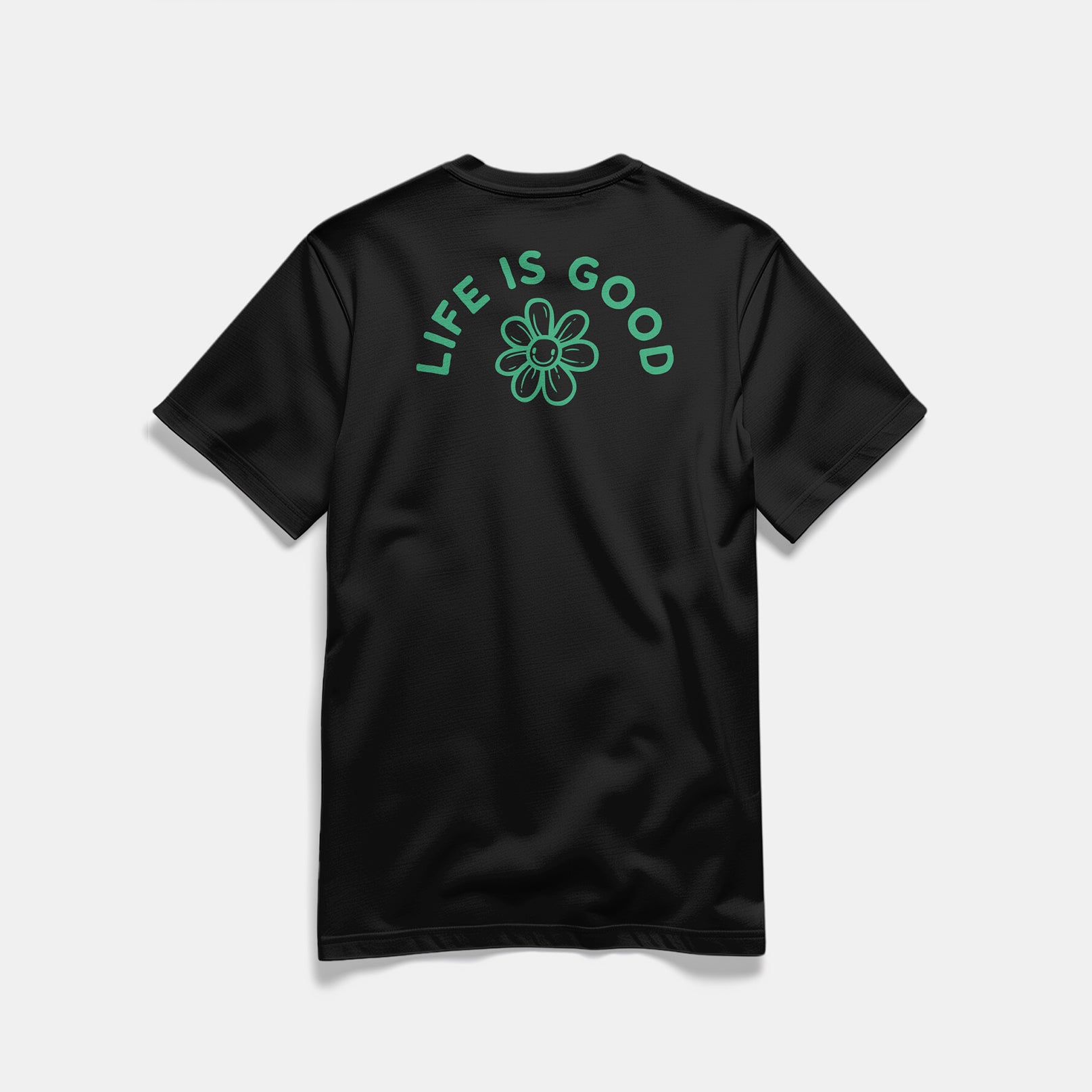 Mockup retro maglietta unisex girocollo nera in cotone biologico con icone di fiore e scritta verde “Life is good” Totally Random